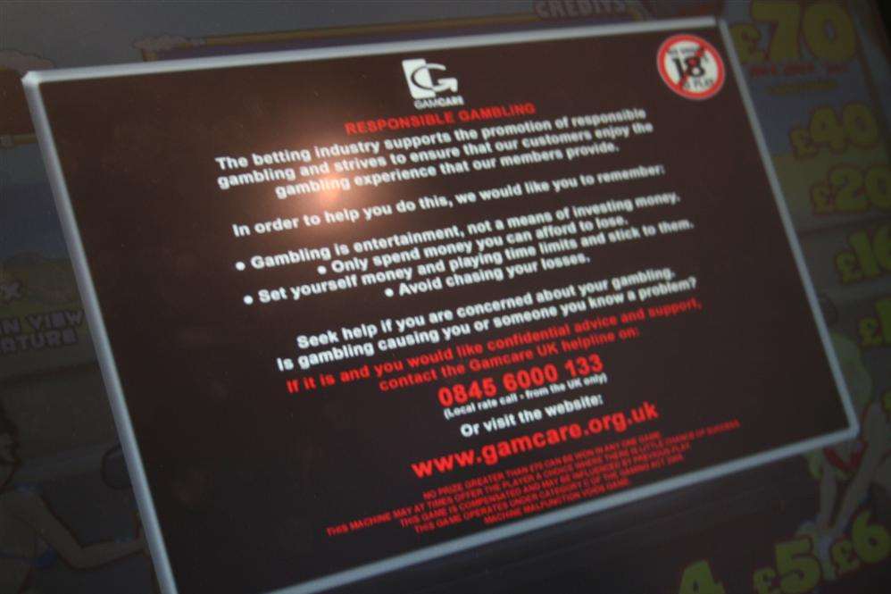 A 'responsible gambling' warning on a machine