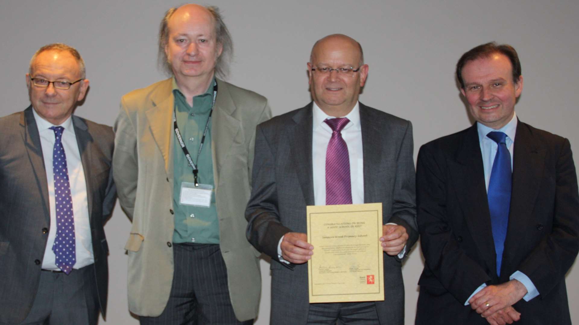 Left to right: Patrick Leeson with Andy Bax, the Senacre Wood chairman of governors, Peter Hellman and Roger Gough