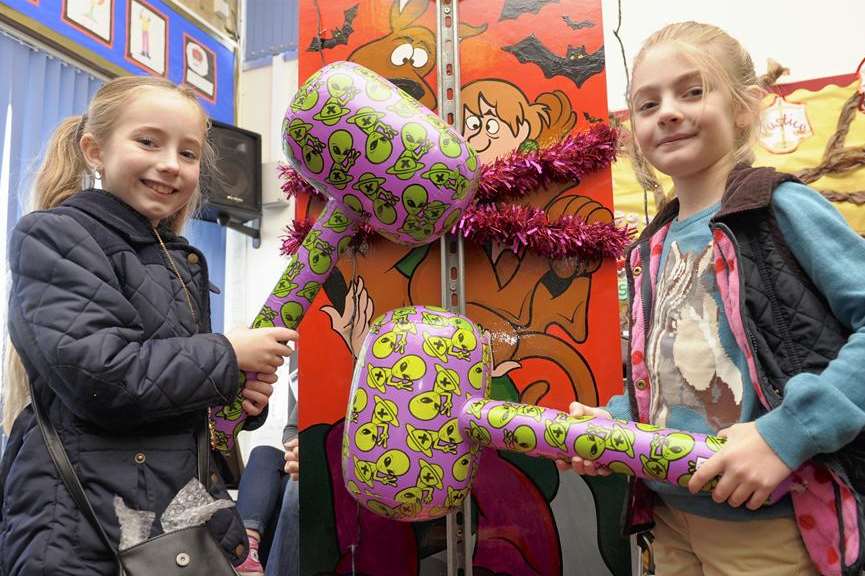 Xanthi, 7, left, and Chloe, 7. Christmas Fair at Sutton at Hone CE Primary School