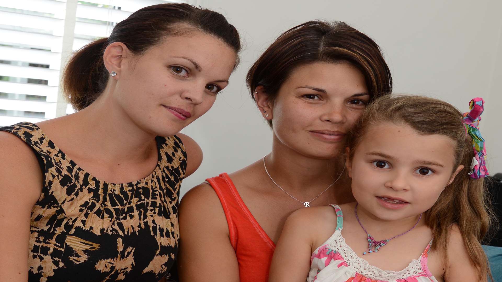 Talleulah last summer with her mother and aunt, Sally Harper.