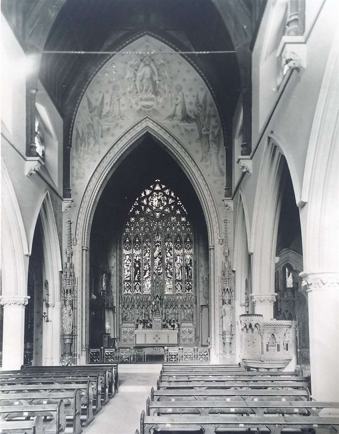 An old photo shows how the sanctuary arch wall used to look (Diocese of Shrewsbury/PA)