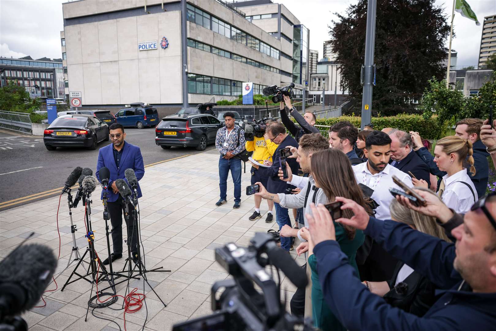 Solicitor Akhmed Yakoob speaks to the media outside Rochdale police station in Greater Manchester (James Speakman/PA)