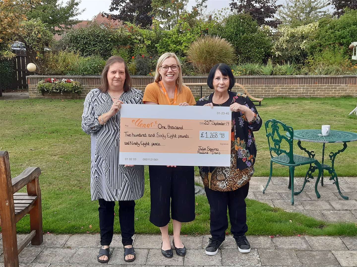 A fundraiser was held in memory of Michael. From left to right: Michael's sister, Julie Squires, Ellenor fundraiser, Melissa Bourne, and Michael's mum, Pauline Davis with the cheque. (18119113)