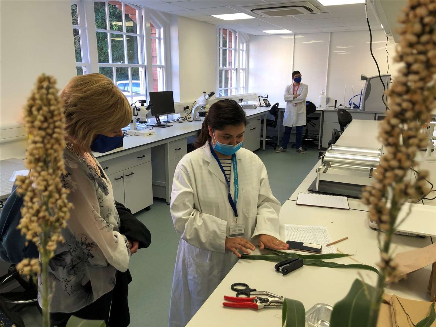 From left: Prof Jane Harrington watches as a student demonstrates how to use the new technology in agronomy lab. Picture: University of Greenwich (51513201)