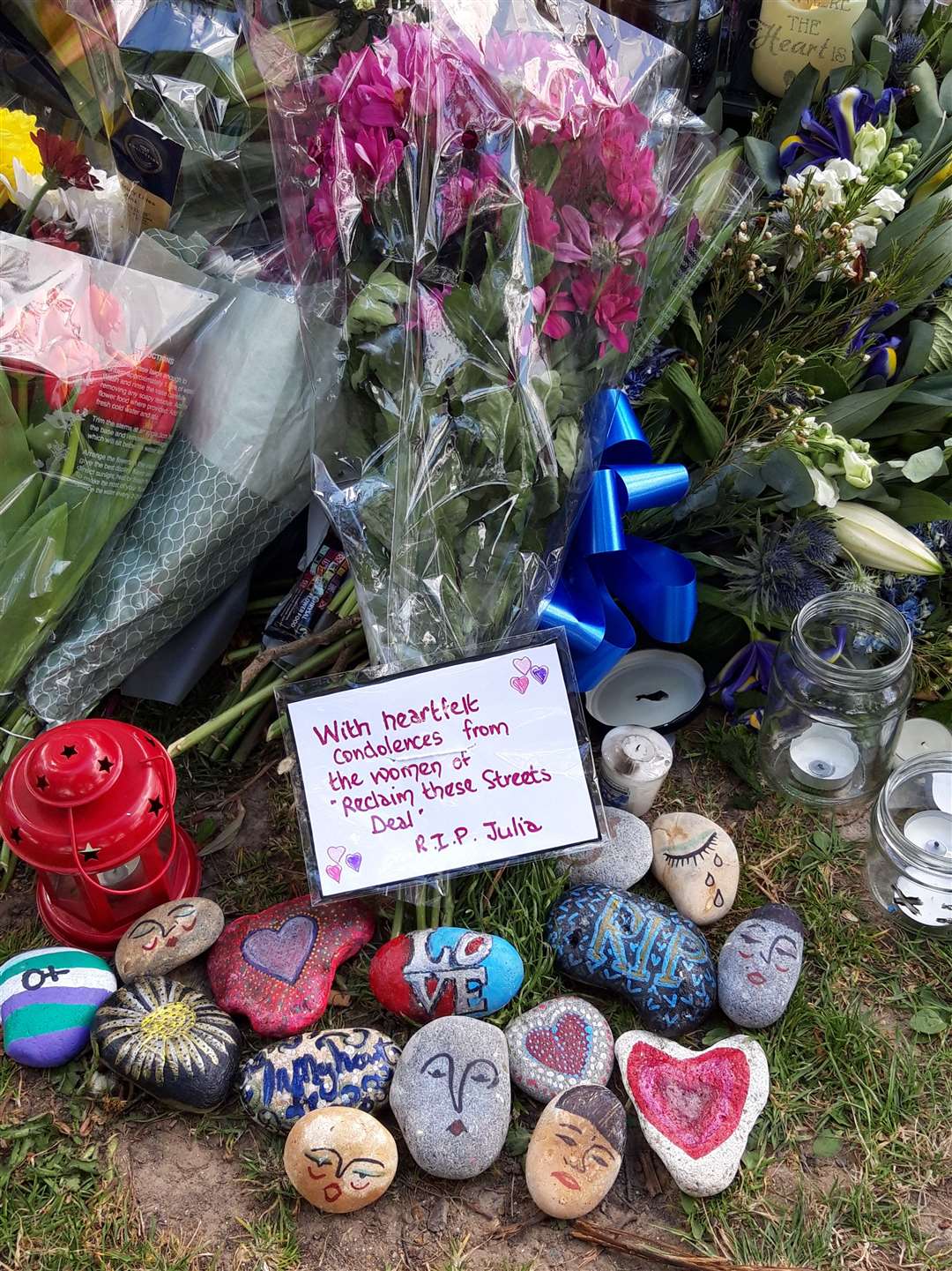 The decorated pebbles and flowers from Reclaim These Streets. Picture: Susan Carlyle