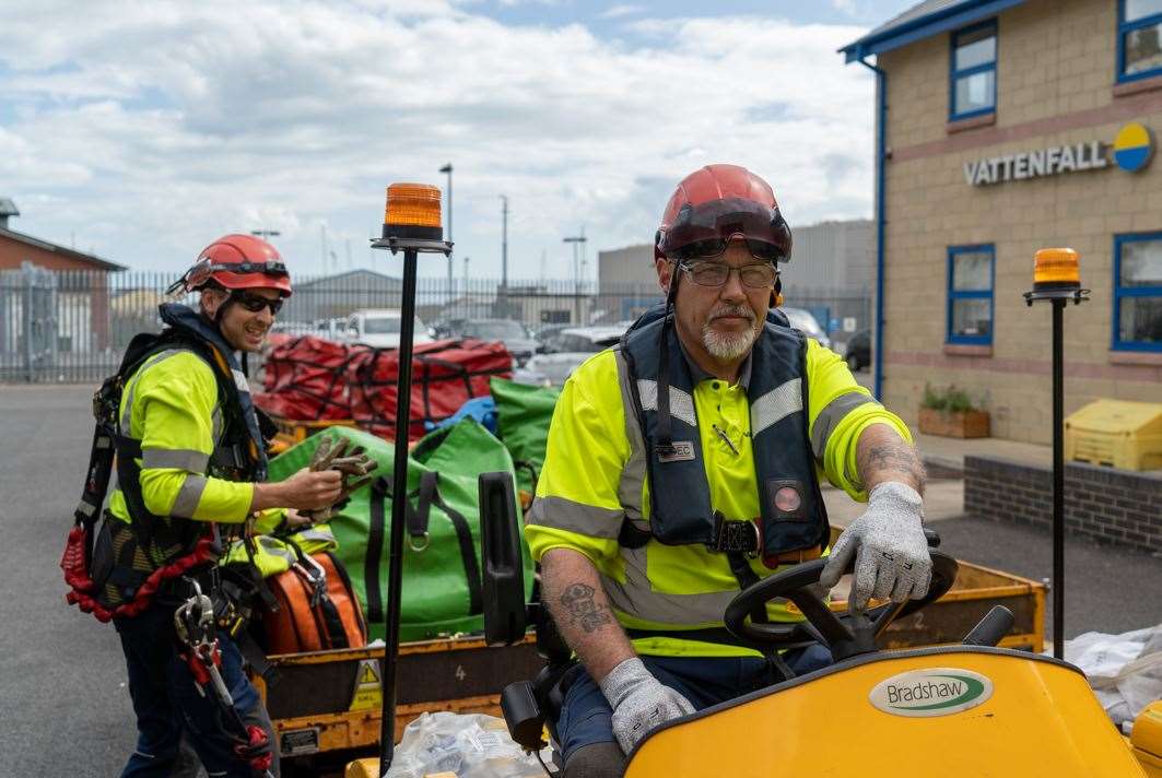 Technicians prepare to go offshore. Photo by Edward Thompson