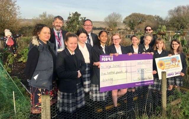 Wye School's prize-winning Nature Club with, from left, the school's deputy behaviour for learning coach Marina Capriotti, The Education People CEO James Roberts and Wye School principal Luke Magee (22129015)