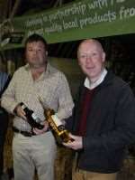 Farmer Doug Wanstall shows rural affairs minister Jonathan Shaw some of the products that Kent produce goes into.