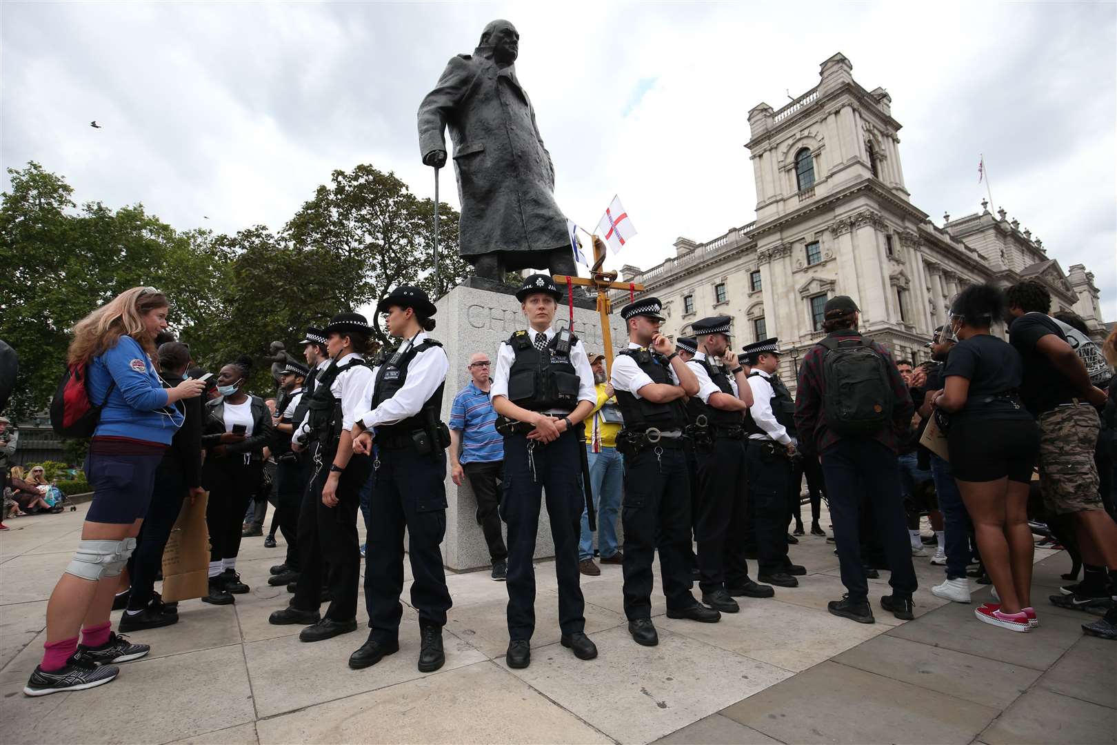 Police surround the Winston Churchill statue in Parliament Square, London (Jonathan Brady/PA)