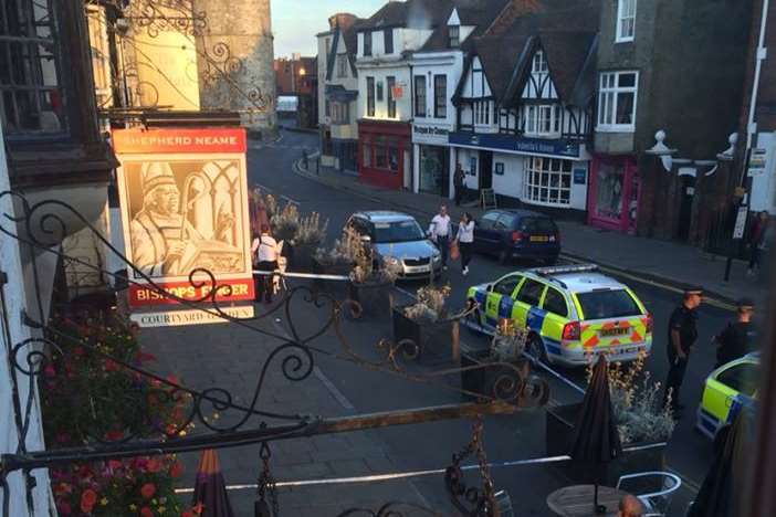 Police sealed off the area outside the Bishops Finger pub
