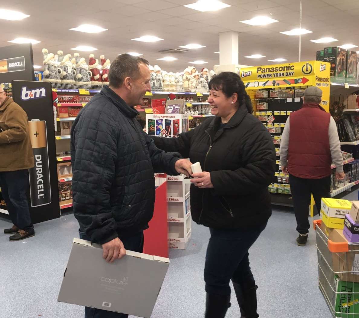 Ann Russell proposes to her boyfriend Robin at the B&M store in Gravesend