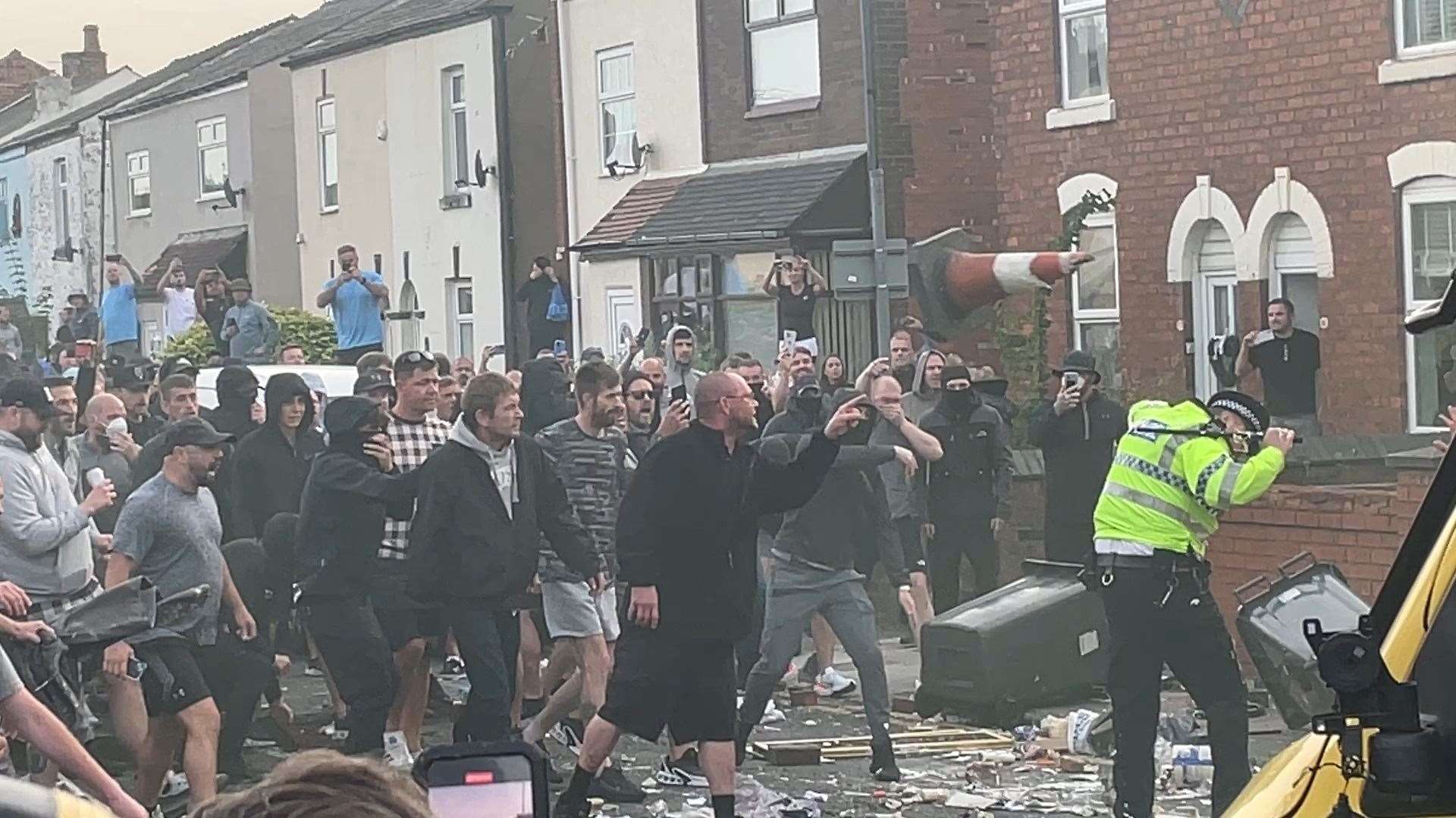 Trouble flares during a protest in Southport, after three children died and eight were injured in a ‘ferocious’ knife attack (Richard McCarthy/PA)