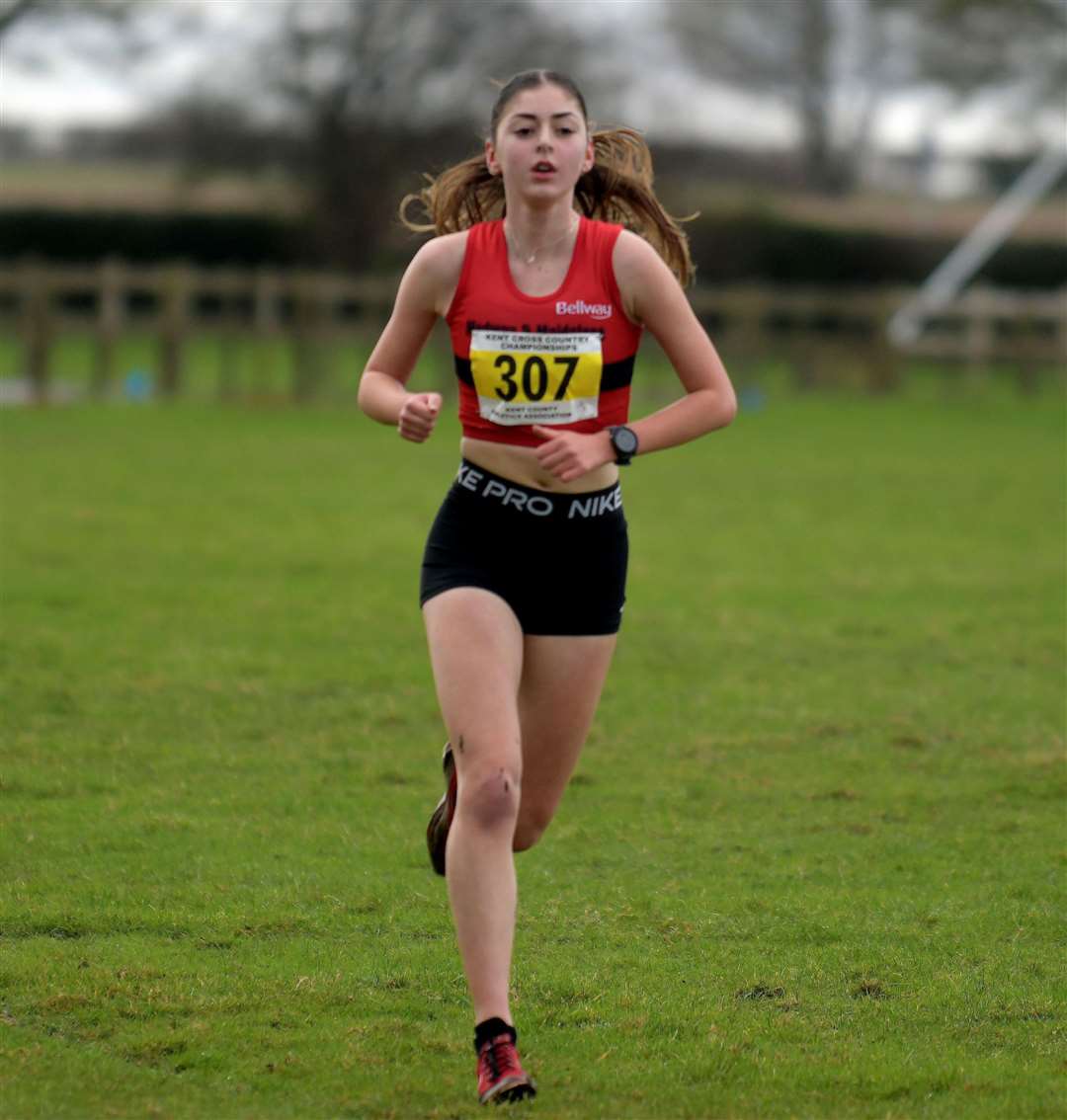 Ella Webb gives chase on her way to second place in the under-20 women’s event for M&M. Picture: Barry Goodwin