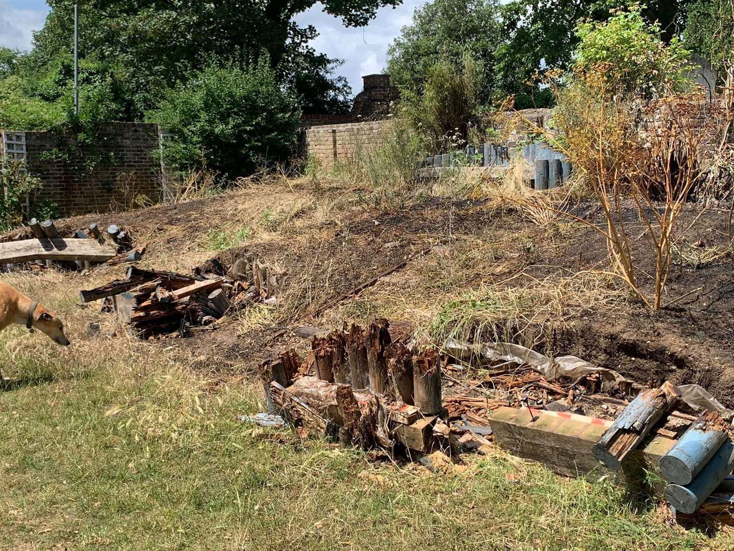 Three benches were set alight in the community garden next to St Botolph's Church, The Hill, Northfleet, Gravesend