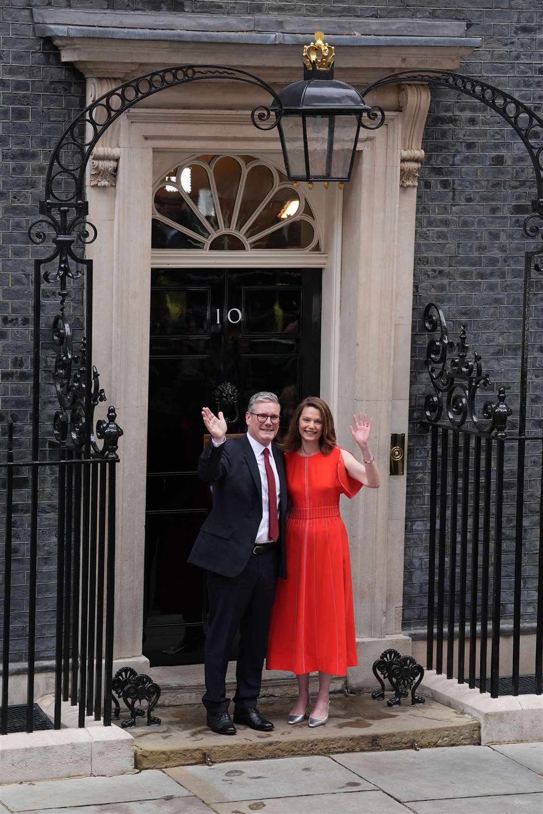 Sir Keir Starmer and his wife Lady Starmer outside 10 Downing Street (Gareth Fuller/PA)