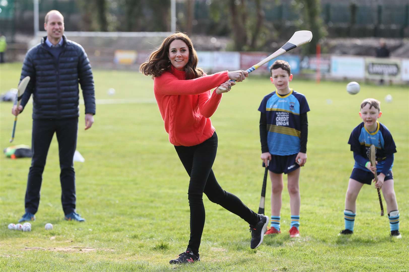 Kate trying out hurling during a visit to a local Gaelic Athletic Association (GAA) club in Ireland (Brian Lawless/PA)