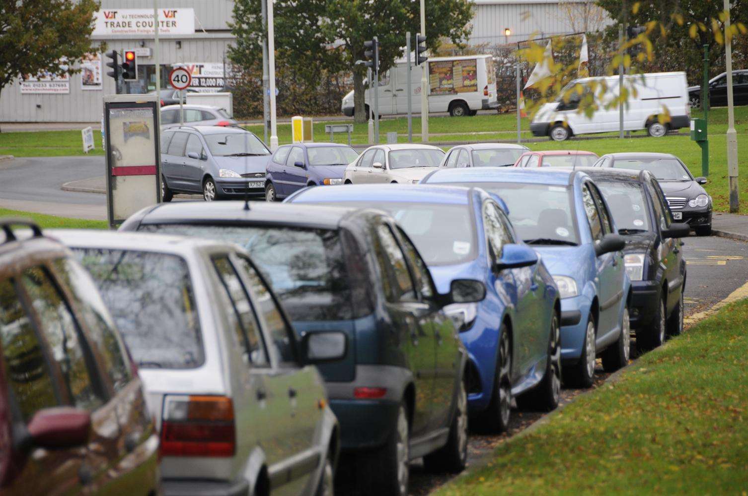 Cars parked along Loudon Way, Godinton Park