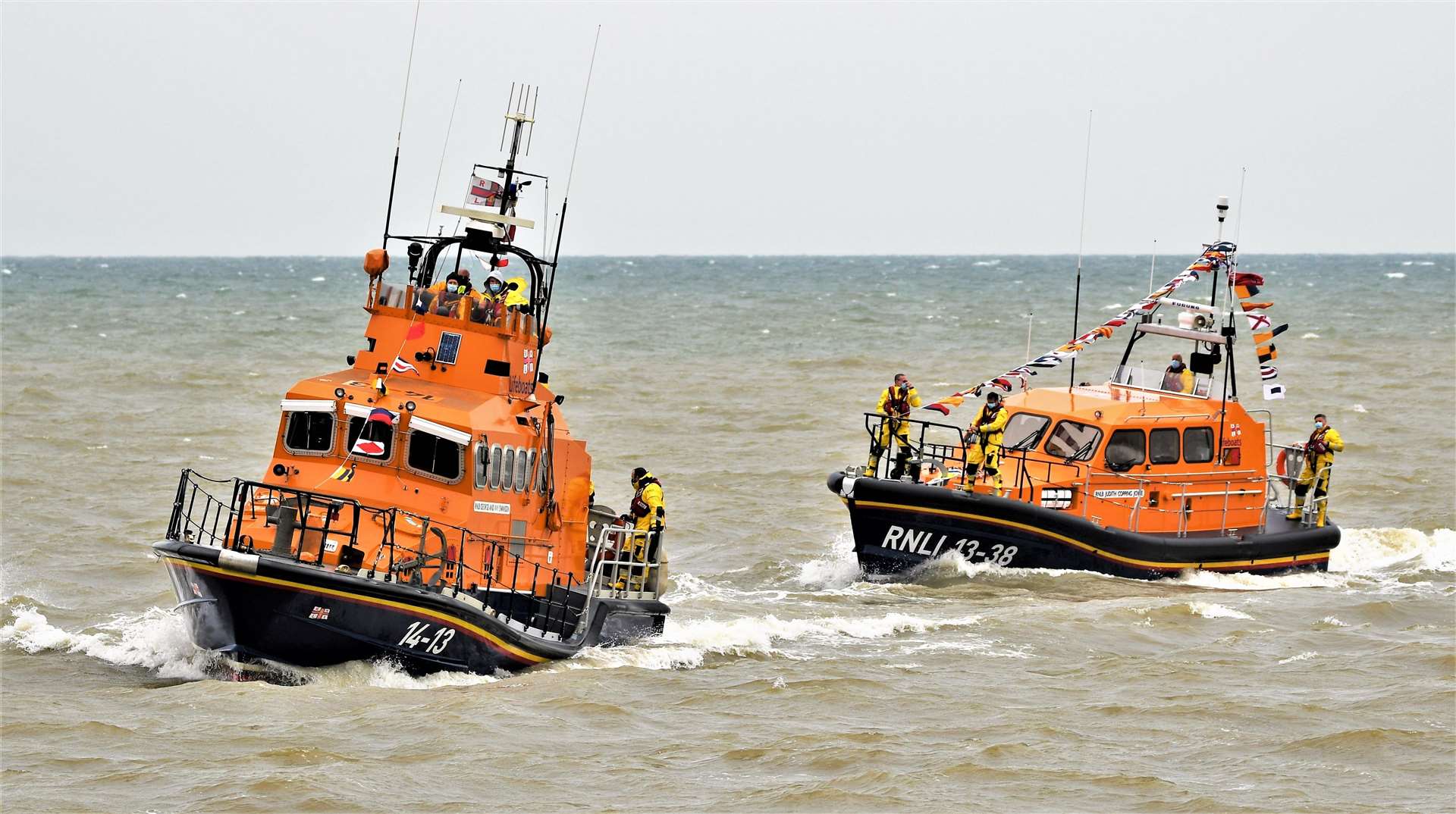 Old and new Sheerness lifeboats - the George and Ivy Swanson, left, and the smaller Judith Copping Joyce off Minster, Sheppey. Picture: RNLI Vic Booth