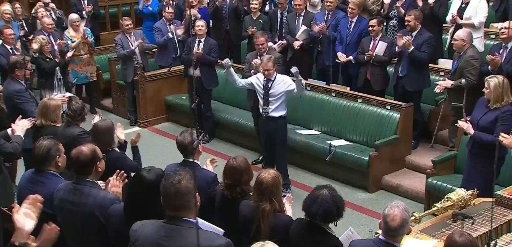 Craig Mackinlay is applauded by members of Parliament as he returns to the House of Commons for the first time since he was rushed into hospital with sepsis (UK Parliament/PA)