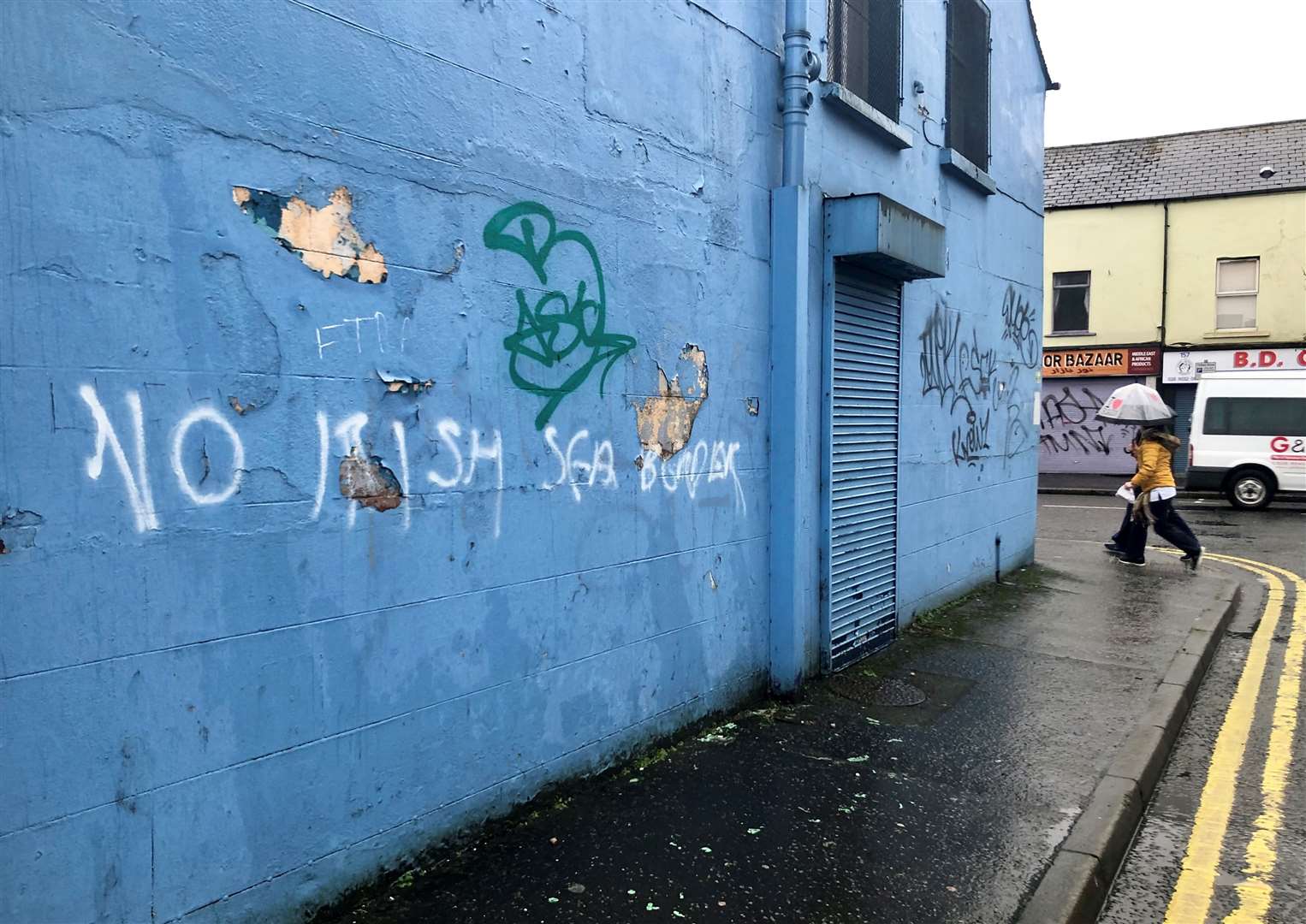 Graffiti reading ‘No Irish Sea border’ near Belfast City centre (David Young/PA)