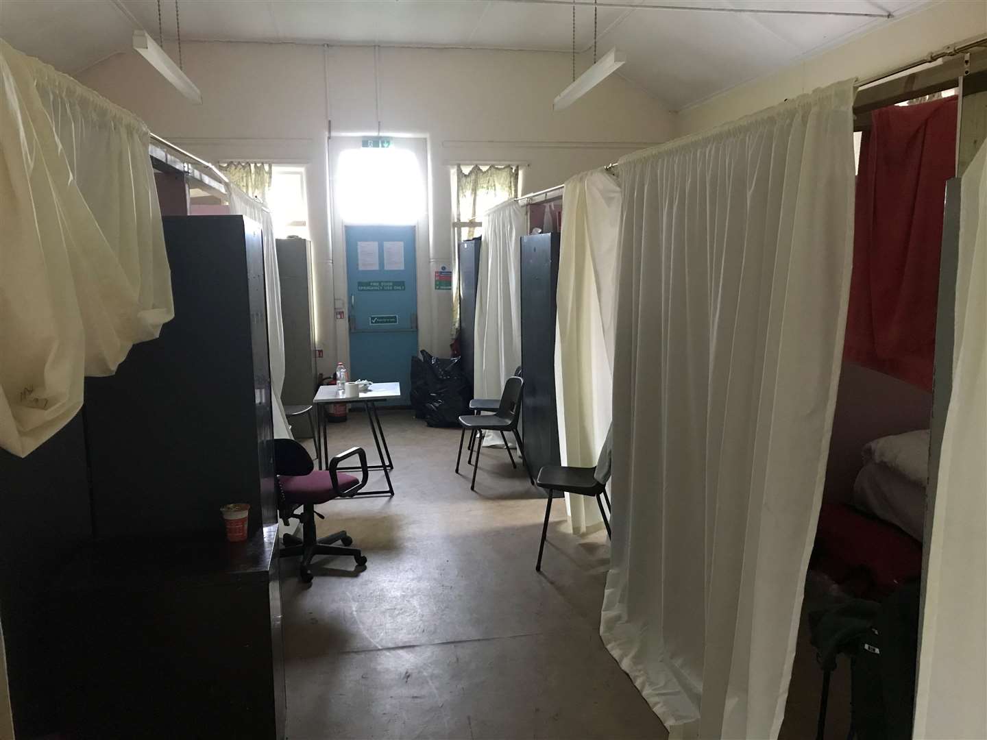 The Independent Chief Inspector of Borders and Immigration (ICIBI) and Her Majesty’s Inspectorate of Prisons (HMIP) criticised “impoverished” accommodation in Napier Barracks in Kent in their report (ICIBI/HMIP/PA)