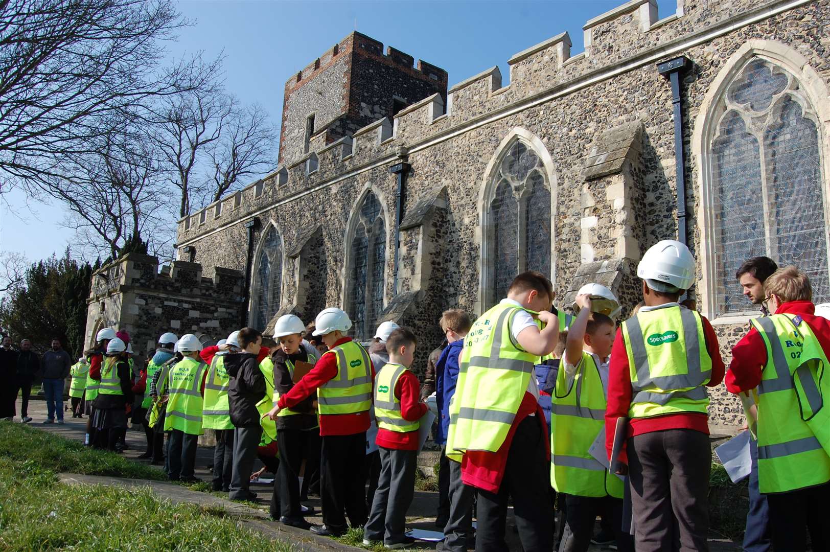 St Botolph's School pupils prepare to enter the church.