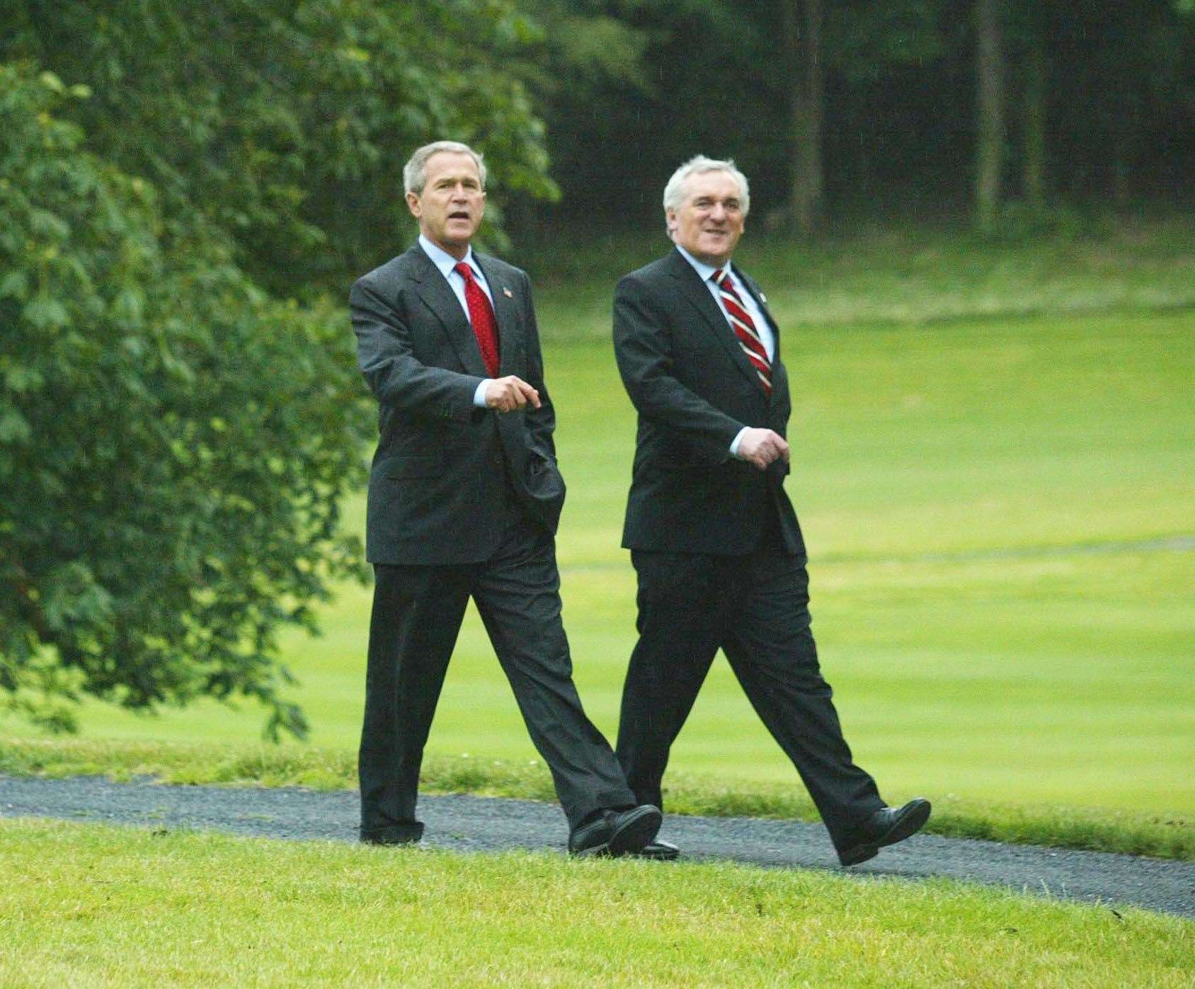 George Bush and Bertie Ahern in 2004 (Maxwell’s/PA)