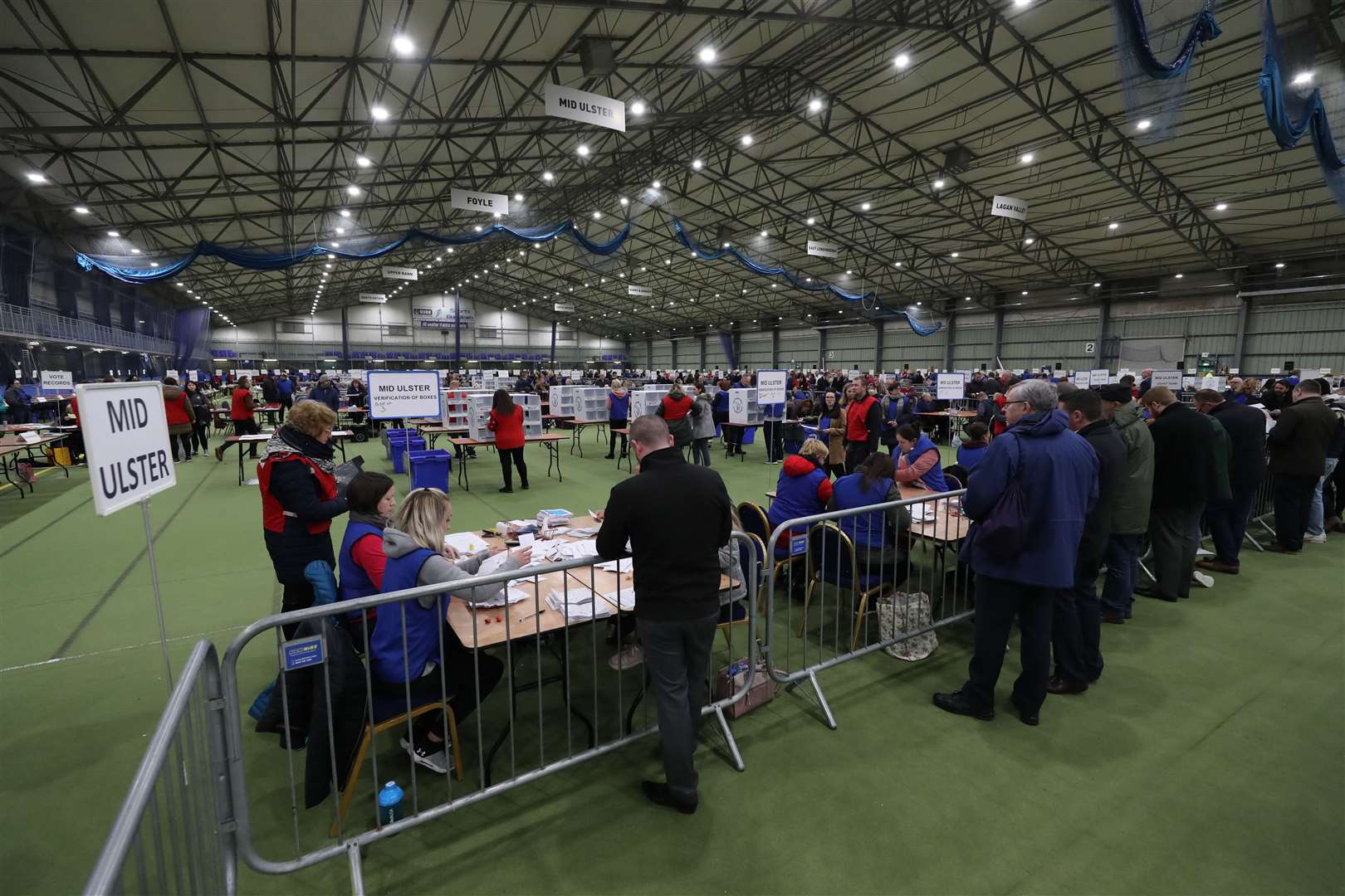 Ballot boxes are opened during the count at the Meadowbank Sports Arena for the 2019 general election (Niall Carson/PA)