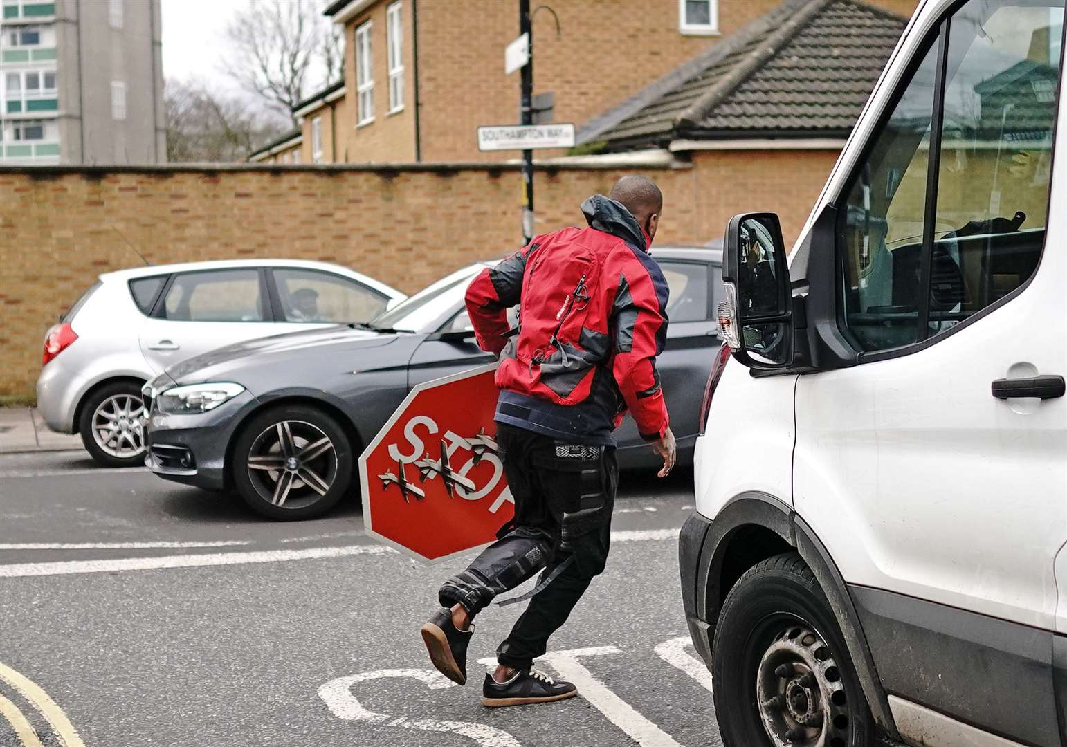 Less than an hour after Banksy confirmed it was genuine by posting a photo of it on social media, witnesses saw the artwork being removed by a man with bolt cutters (Aaron Chown/PA)