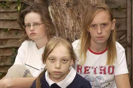 GRIEF STRICKEN: Mandy Strevens, left, with an unforgiving Heather Hackett and Heather's daughter, Nichola Strevens. Picture: ANDY PAYTON