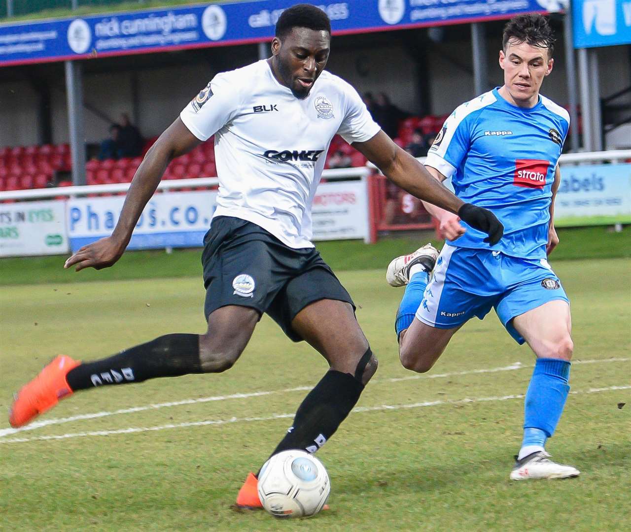 Dover's Inih Effiong gets a shot away against Harrogate Picture: Alan Langley