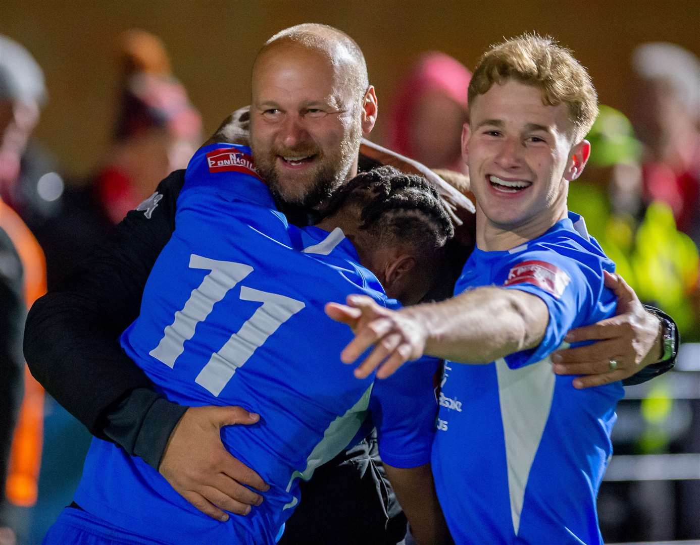 Hythe manager Steve Watt celebrates with Shad Ngandu and Ethan Smith. Picture: Ian Scammell