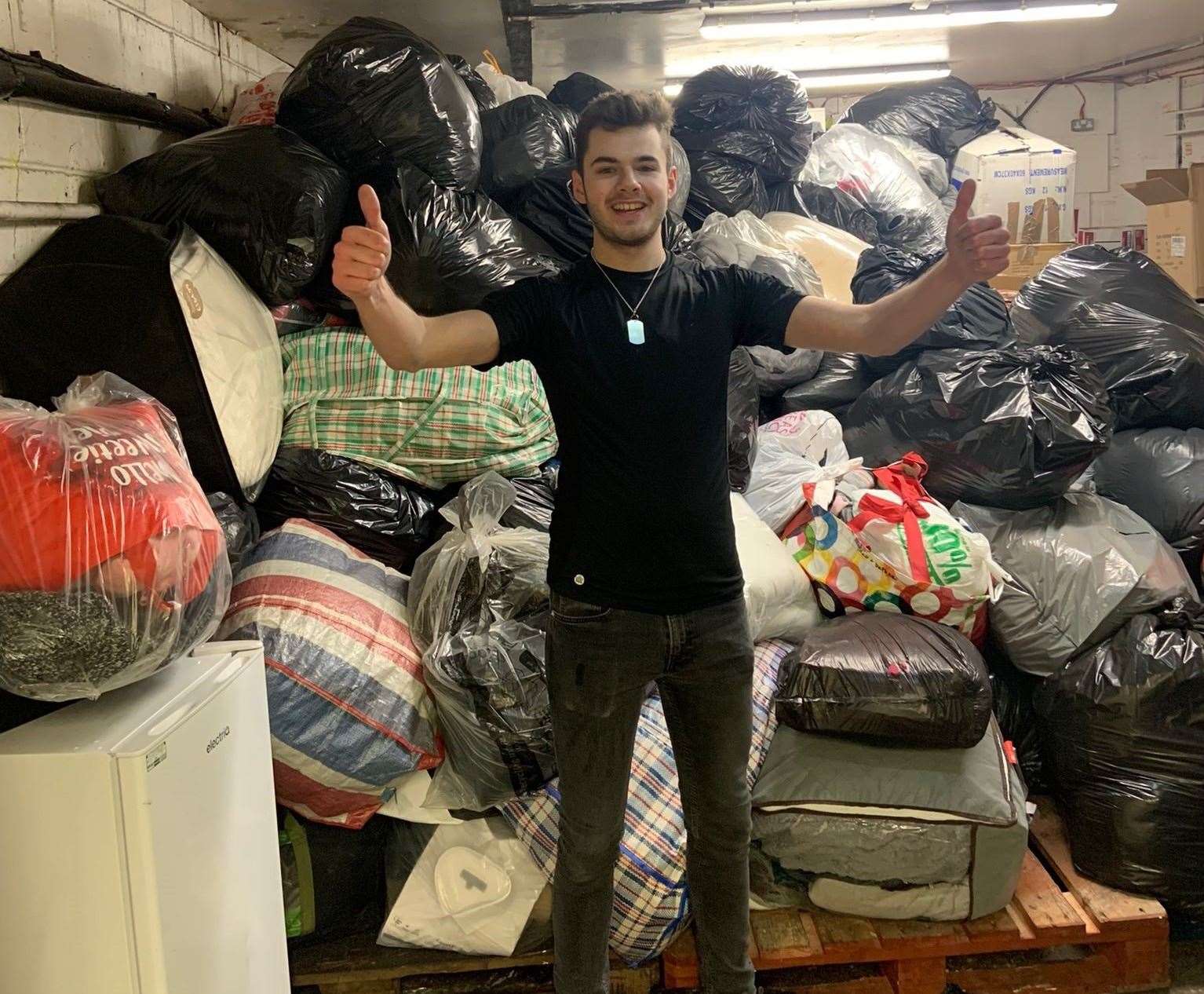 Atik supervisor Jacob Honess with donations. Picture: Atik Dartford