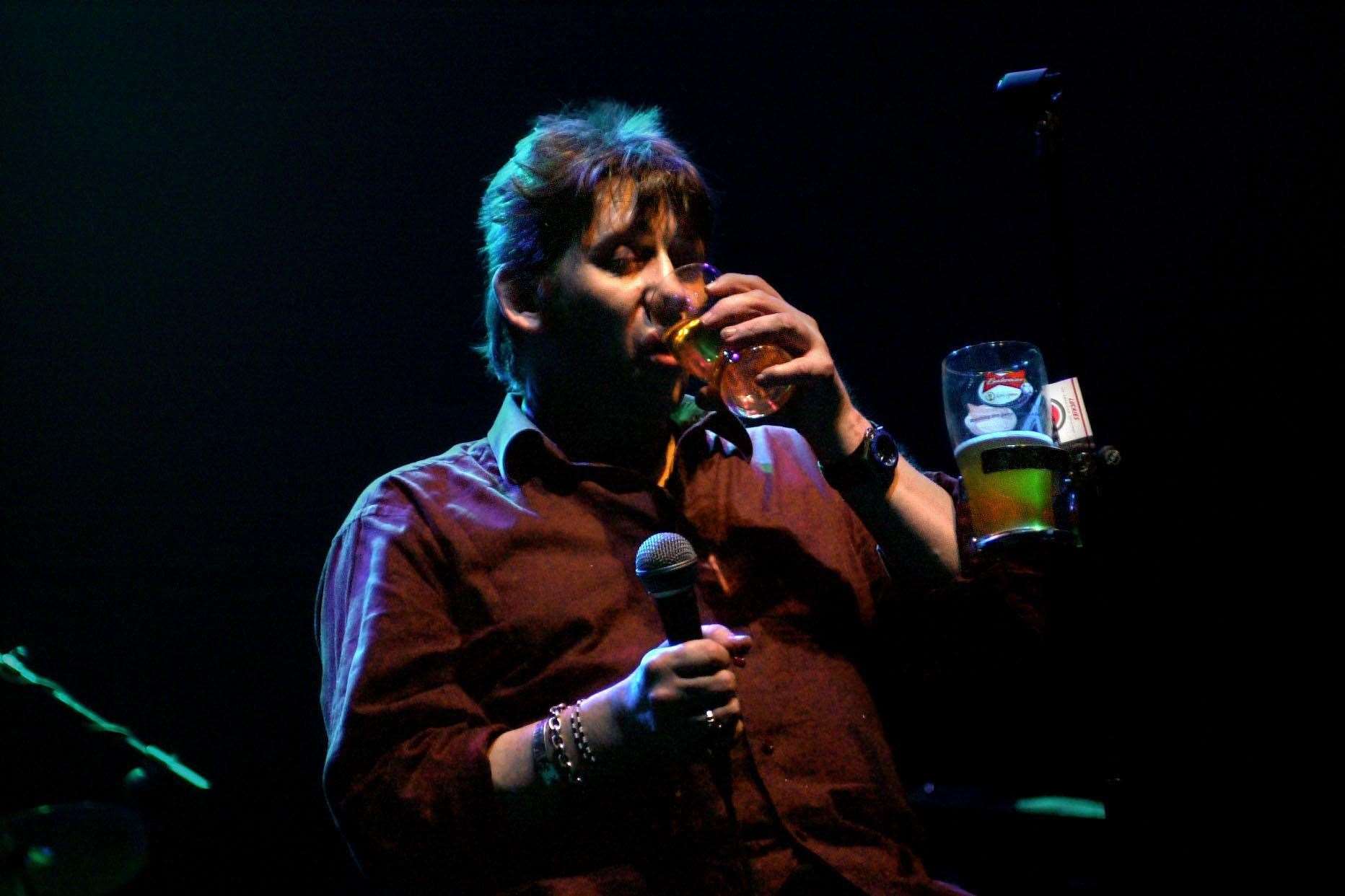 Shane MacGowan and the Popes performing on stage at the Olympia Theatre in Dublin (Hayden West/PA)