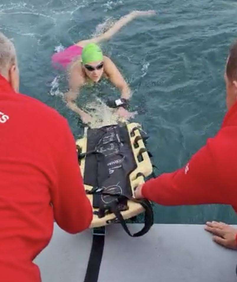 The team got her safely back on the boat using a spinal board. Picture: Aspire