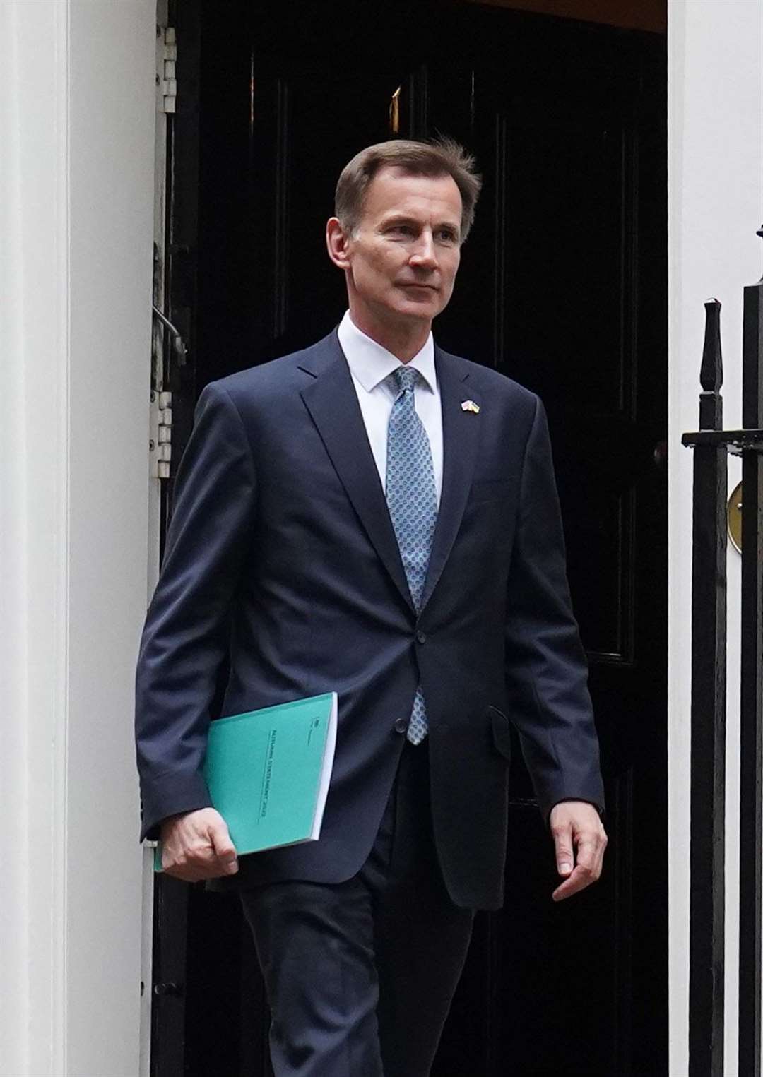 Chancellor of the Exchequer Jeremy Hunt leaves 11 Downing Street for the House of Commons to deliver his autumn statement.