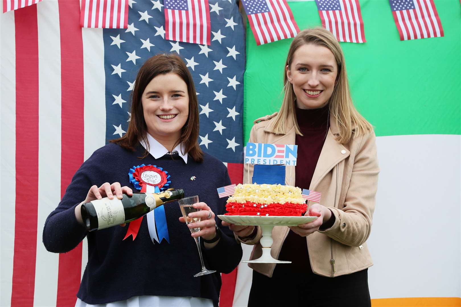 Fifth cousins of Joe Biden, councillor Andrea McKevitt, left, and her sister Ciara, from Co Louth celebrating the US president’s inauguration earlier this year (Brian Lawless/PA)