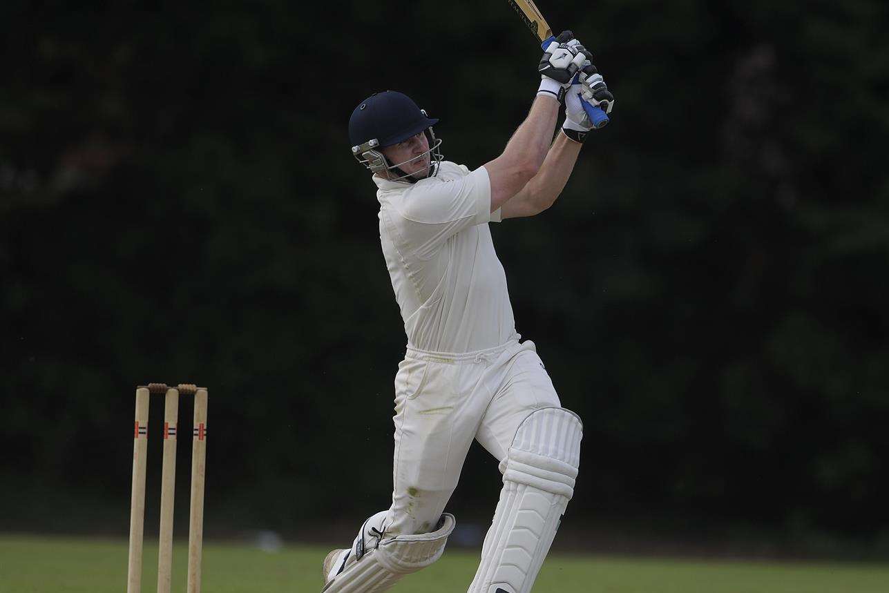 Max Campbell hits out for Canterbury in the Kent League Premier Division clash against Sevenoaks Vine. Picture: Barry Goodwin