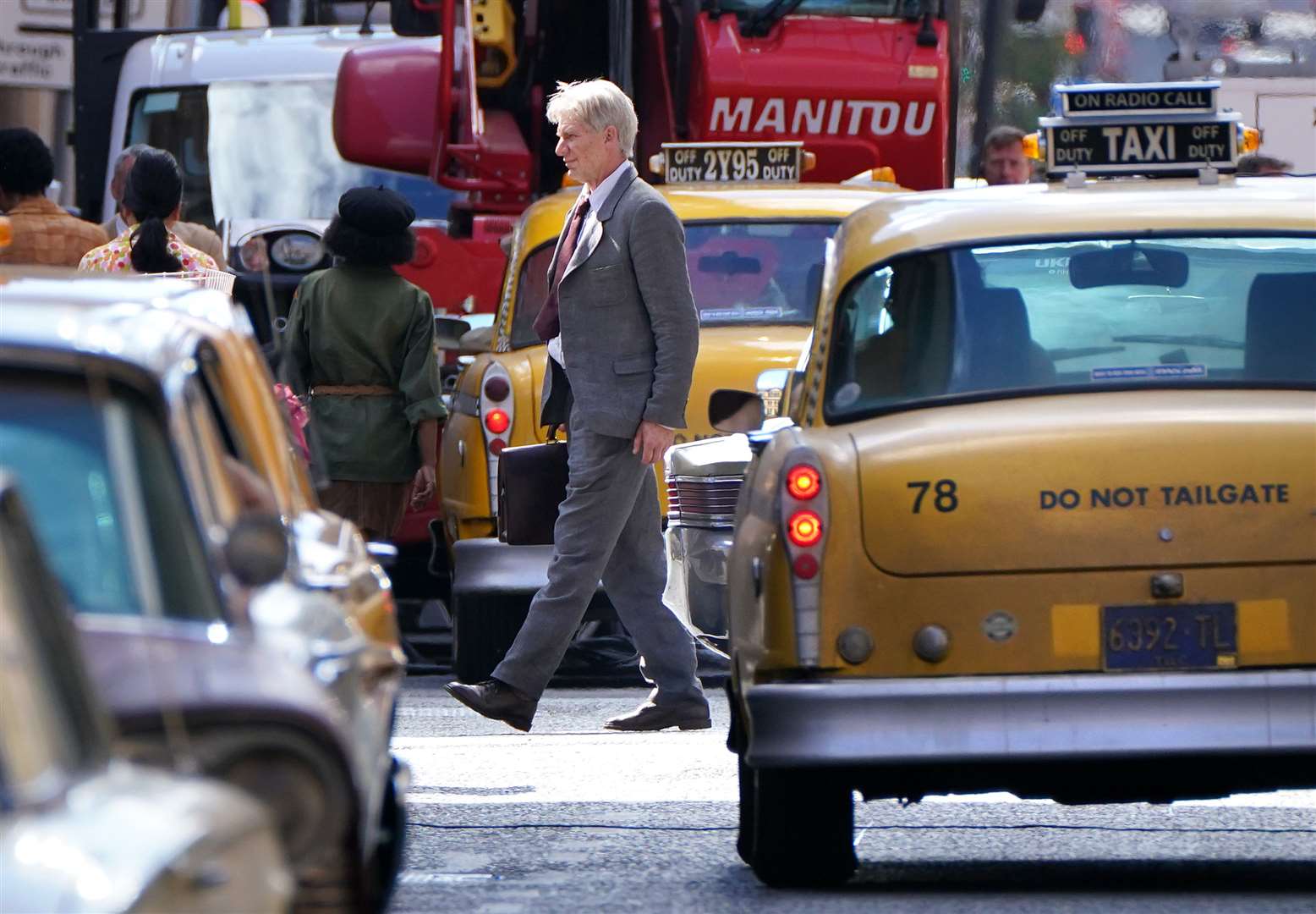 A body-double for Harrison Ford on Cochrane Street in Glasgow city centre (Andrew Milligan/PA)