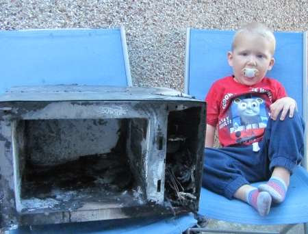 Harry Turner with-burned out microwave