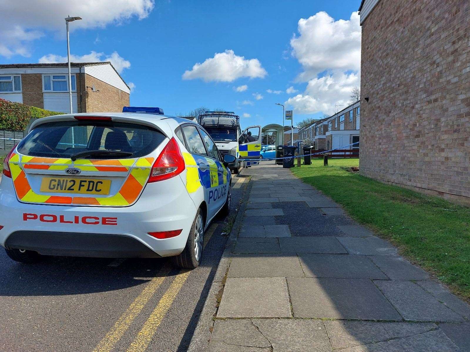 Police have sealed off part of Downs Road in Canterbury