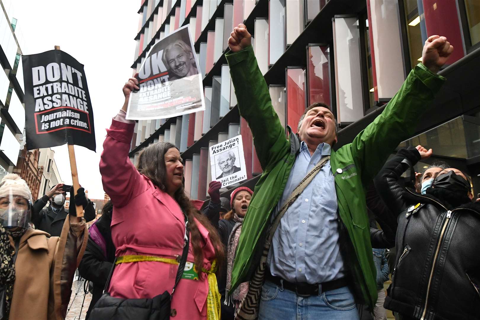 Supporters of Julian Assange celebrate outside the Old Bailey (Dominic Lipinski/PA)