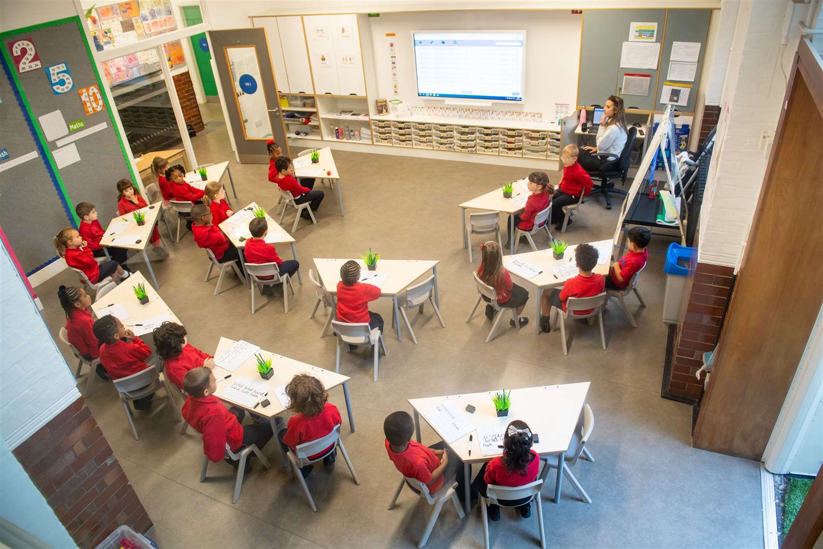 Pupils on the first day back to school at Charles Dickens Primary School in London (Dominic Lipinski/PA)