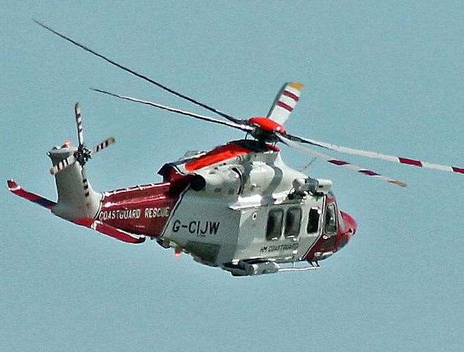 A coastguard rescue helicopter helped to search the area. Stock image