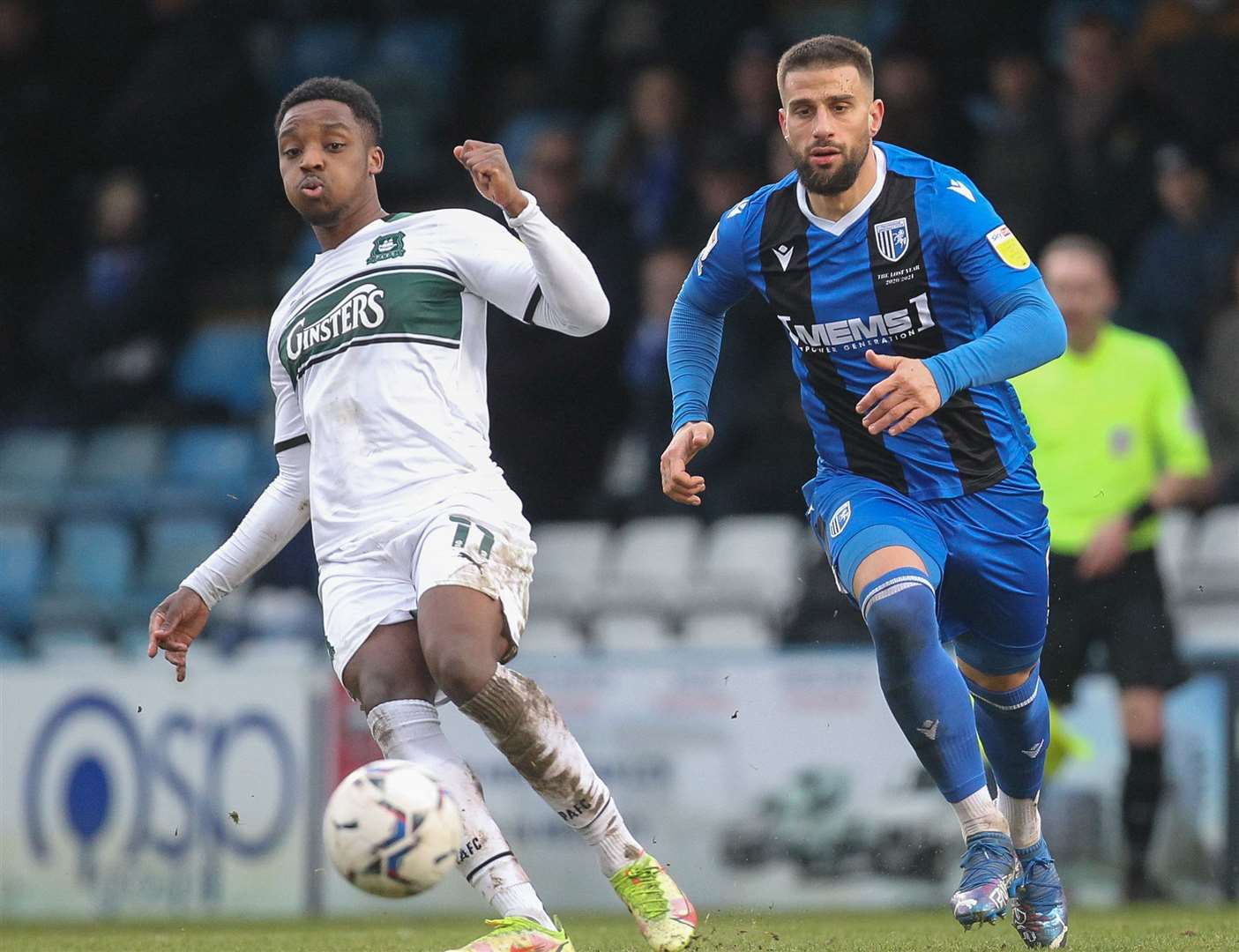 Gillingham defender Max Ehmer closes down Plymouth's Niall Ennis on Saturday. Picture: KPI