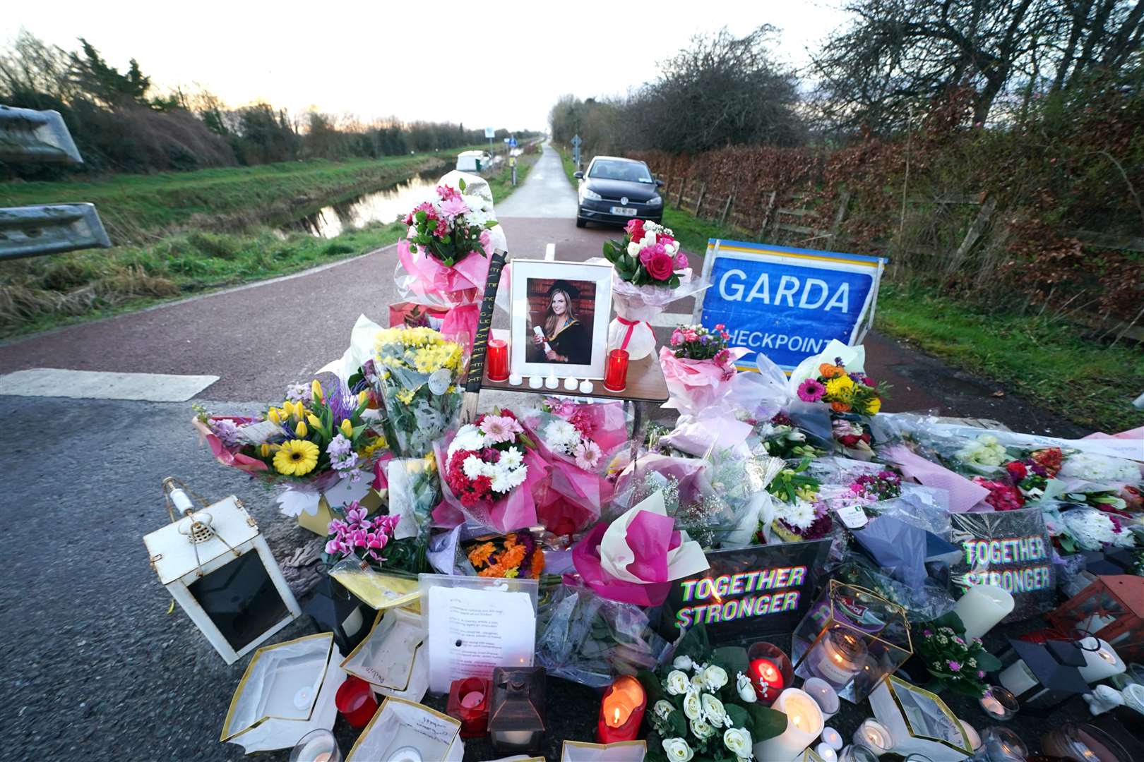 Floral tributes were laid at the Grand Canal in Tullamore, Co Offaly in January 2022 (Brian Lawless/PA)