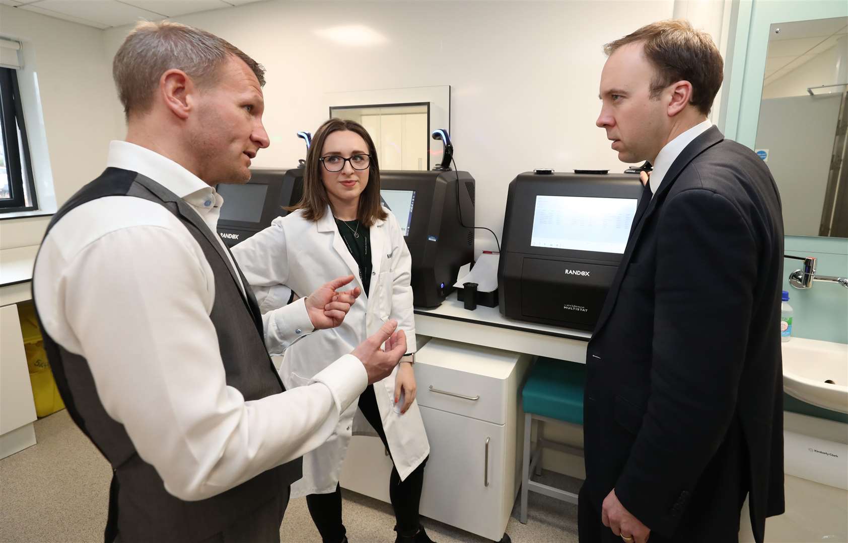 Ron Daniels, left, with Matt Hancock at Randox Labs in Antrim in 2019 (Niall Carson/PA)