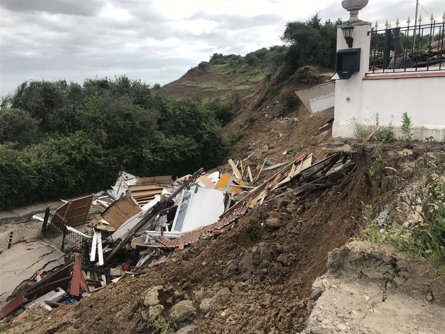 The remains of Emma's family home when it fell off the cliff at Surf Crescent, Eastchurch