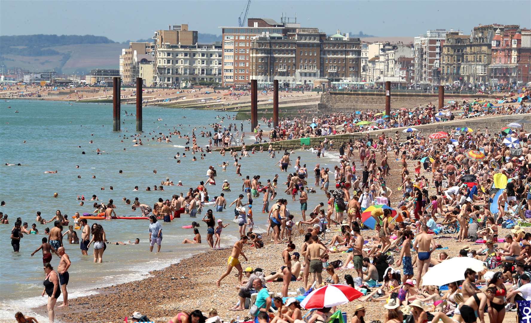 Some British beaches were packed this week but now foreign holidays are back on the cards (Gareth Fuller/PA)