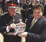 Marcus Coles of Maviga receives the Queen's Award for Enterprise from the Lord Lieutenant of Kent Allan Willett